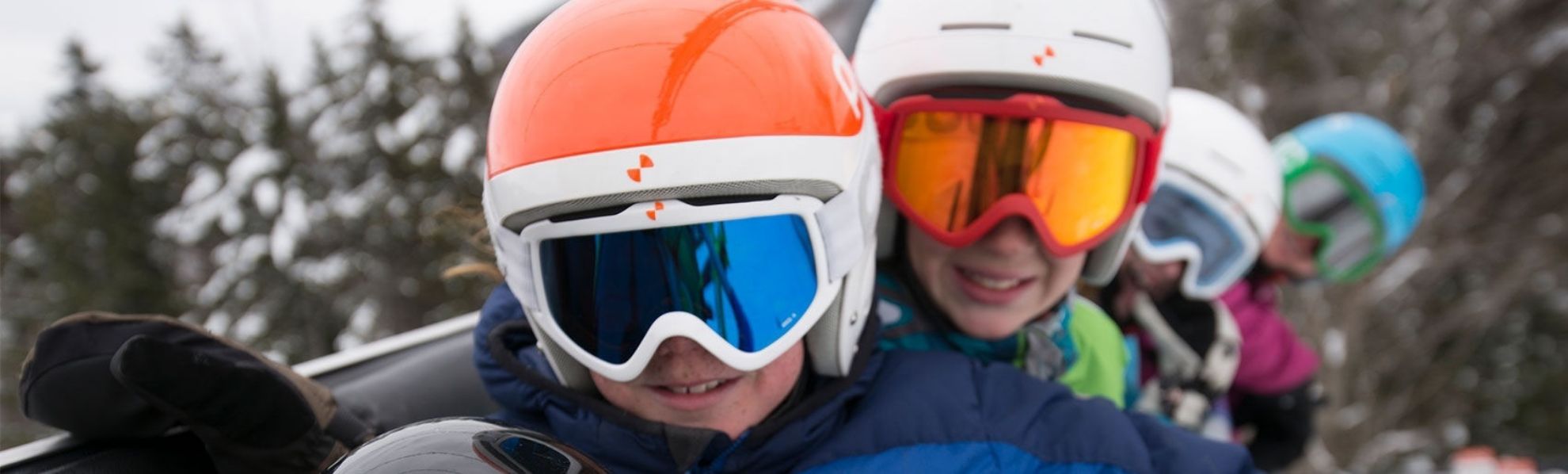 kids on chairlift at Sunday River